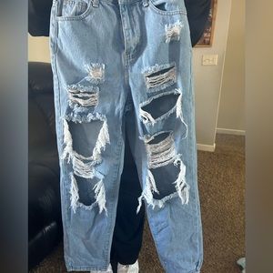 Ripped blue SHEIN jeans.